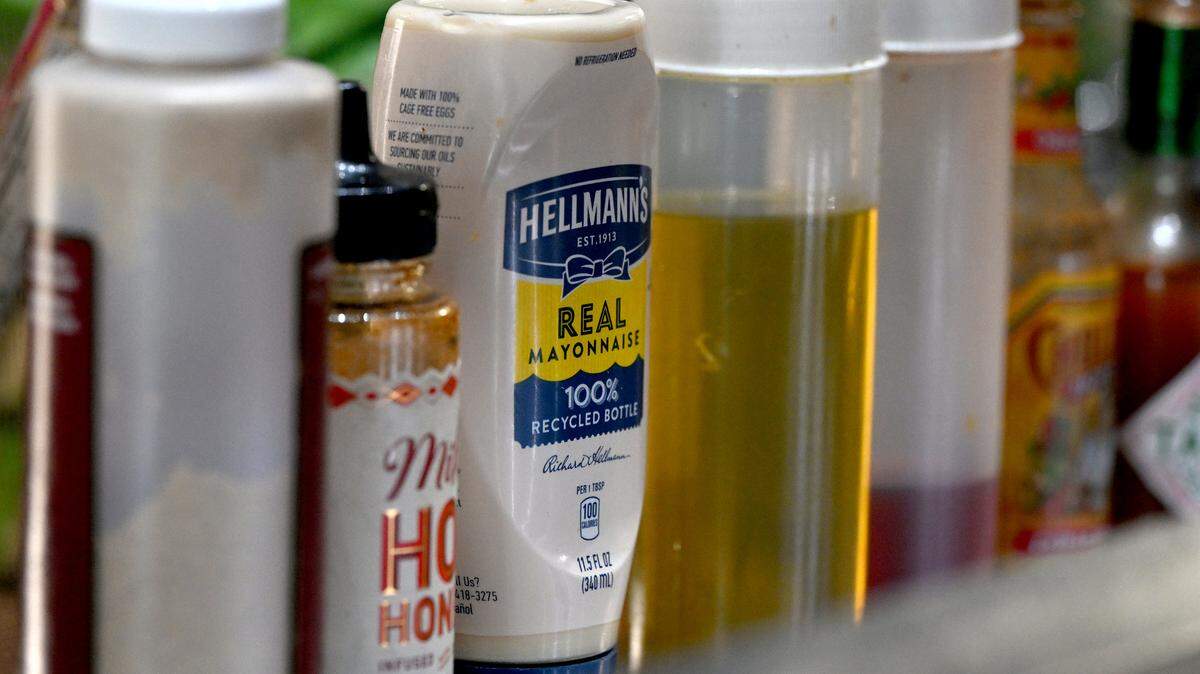 A collection of condiments sits within reach of the sandwich table at The Brown Bag on Old Main Street in downtown Bradenton on May 28, 2025.