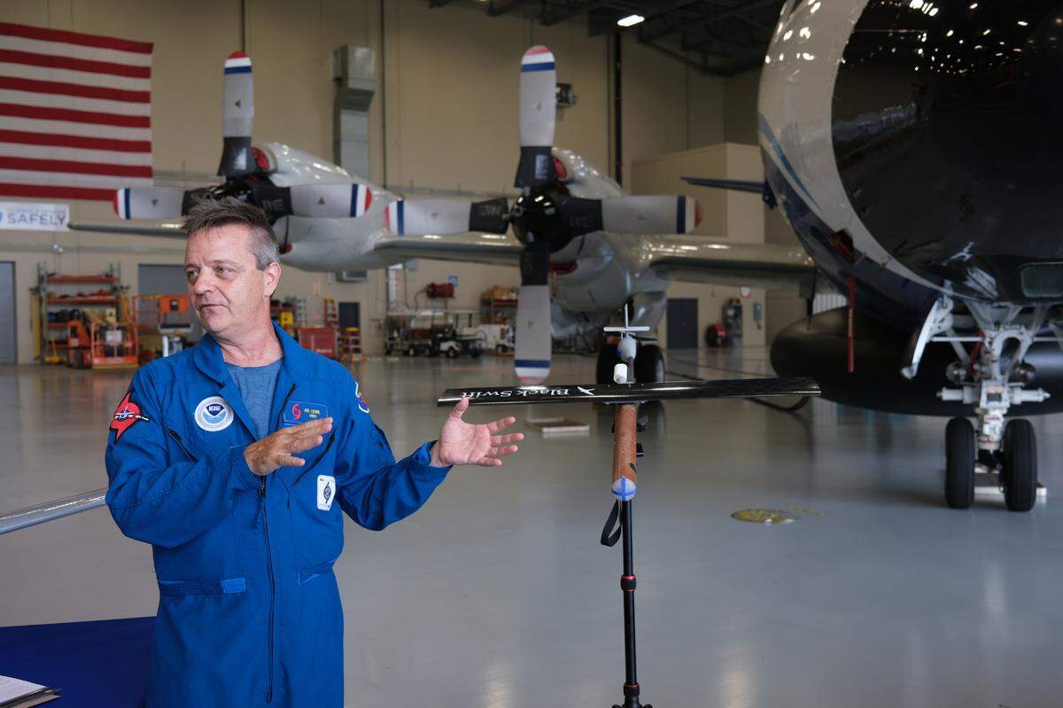 Joseph Cione, lead meteorologist with NOAA’s Hurricane Research Division, discusses how drones can help measure conditions inside of hurricanes at NOAA’s Aircraft Operations Center in Lakeland on June 27, 2023.