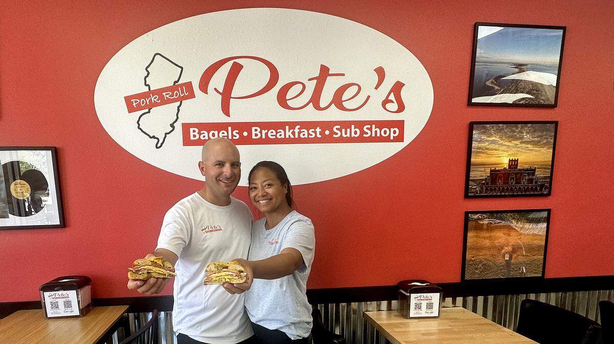 Co-owners Pete Ferraro (left) and AJ Altes (right) hold up the PRP special, made with pork roll, eggs and cheese at their new restaurant, Pork Roll Pete’s, located at 4657 Cortez Road W. in Bradenton. 