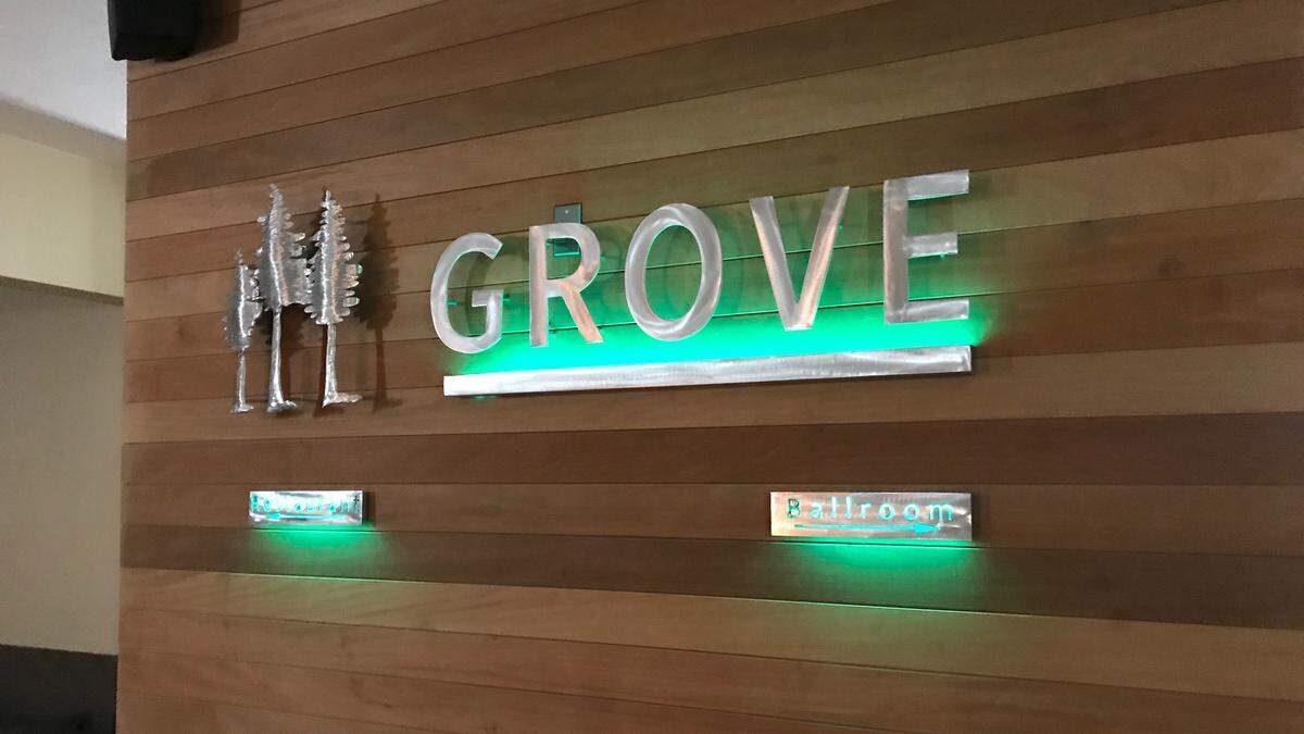 Grove sign points to the restaurant at left, and the ballroom at right. The restaurant is taking reservations and opens to the public Monday, Dec. 10.