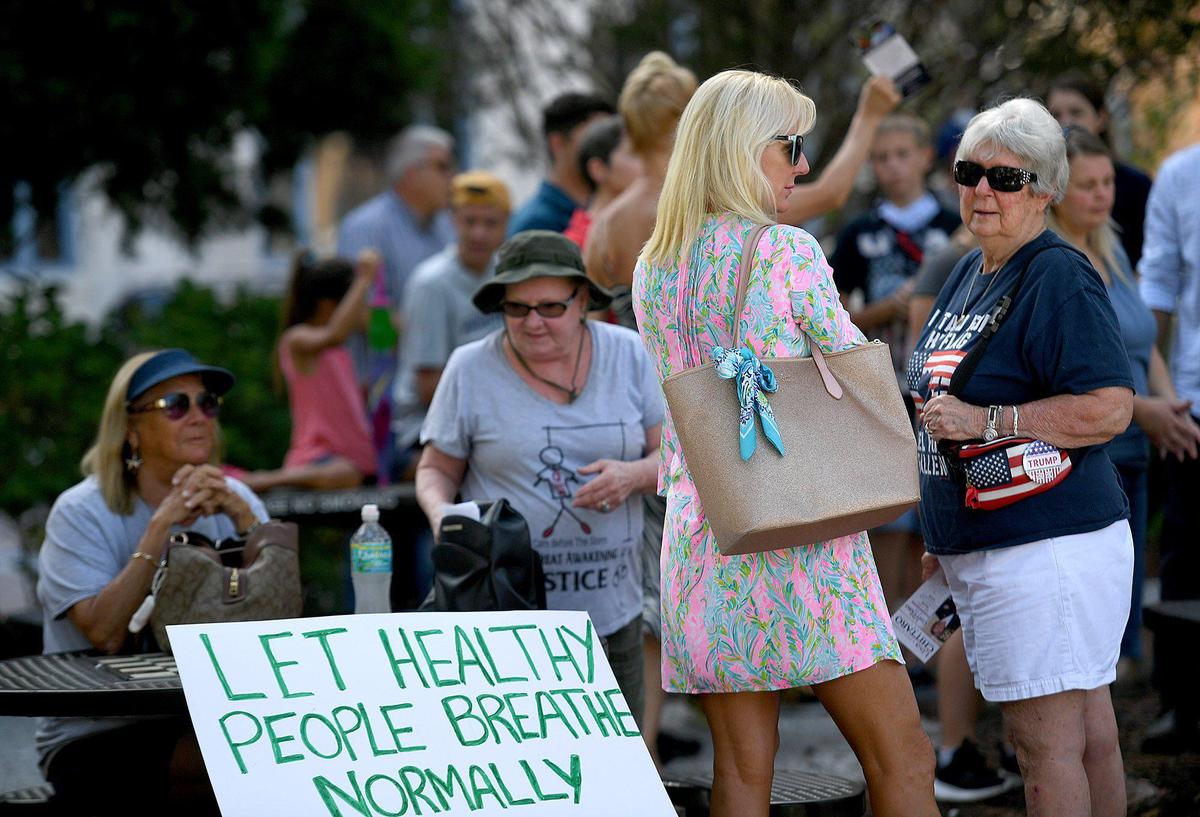 State Rep. Anthony Sabatini leads an anti-mask rally with Rev. Joel Tillis at the Manatee County Courthouse Monday morning along with about 100 people.
