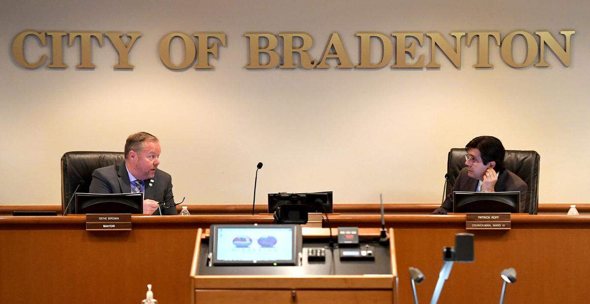 Mayor Gene Brown and Councilman Patrick Roff speak during a Bradenton council meeting on Wednesday morning.
