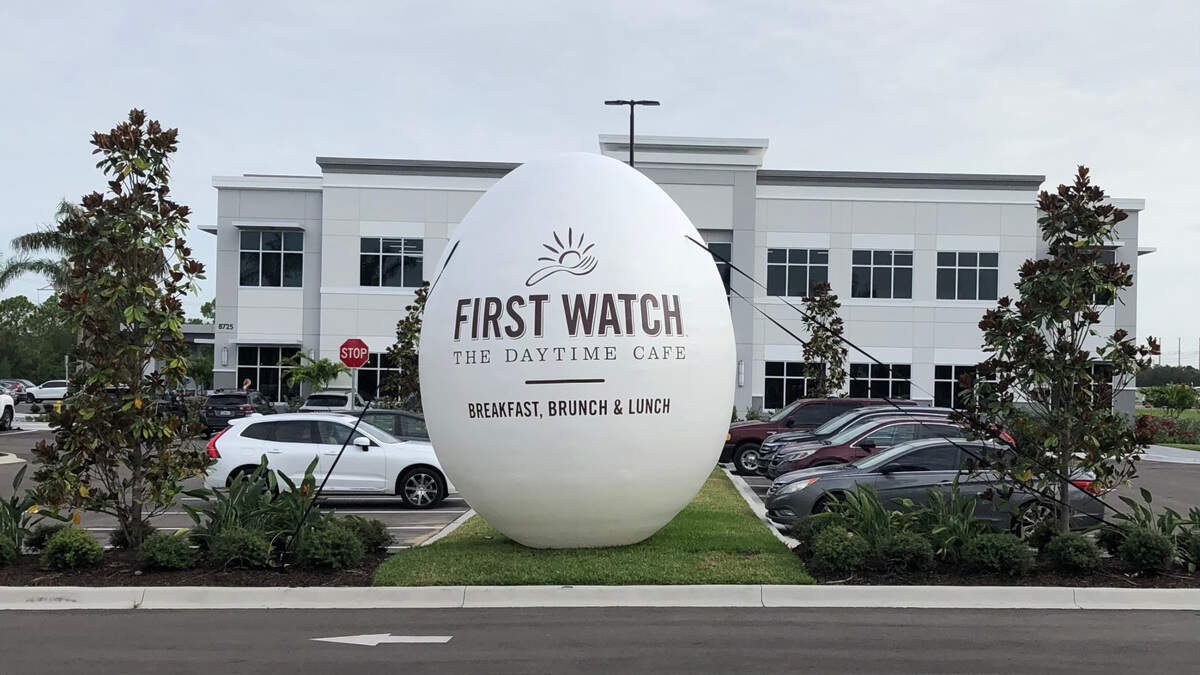 7/15/2021--First Watch restaurants christened the opening of its new corporate headquarters at 8725 Pendery Place, University Place, with an egg cracking ceremony on Thursday, July 15.