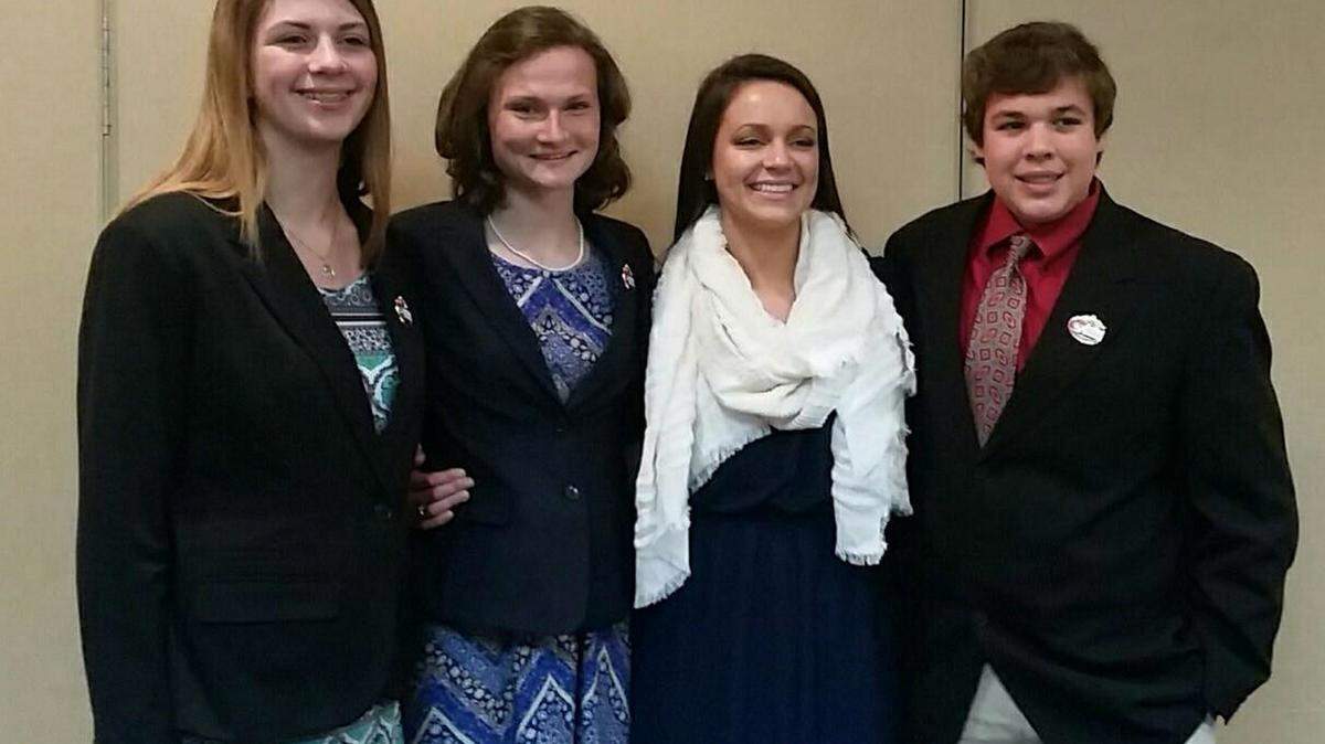 Florida 4-H'ers Casey Wingate, Kirstin Duryea, Kylie Philipps, and Jimmy Ference pose after the National Western Invitational 4-H/FFA Livestock Judging Contest Awards Breakfast in Denver. PROVIDED PHOTO