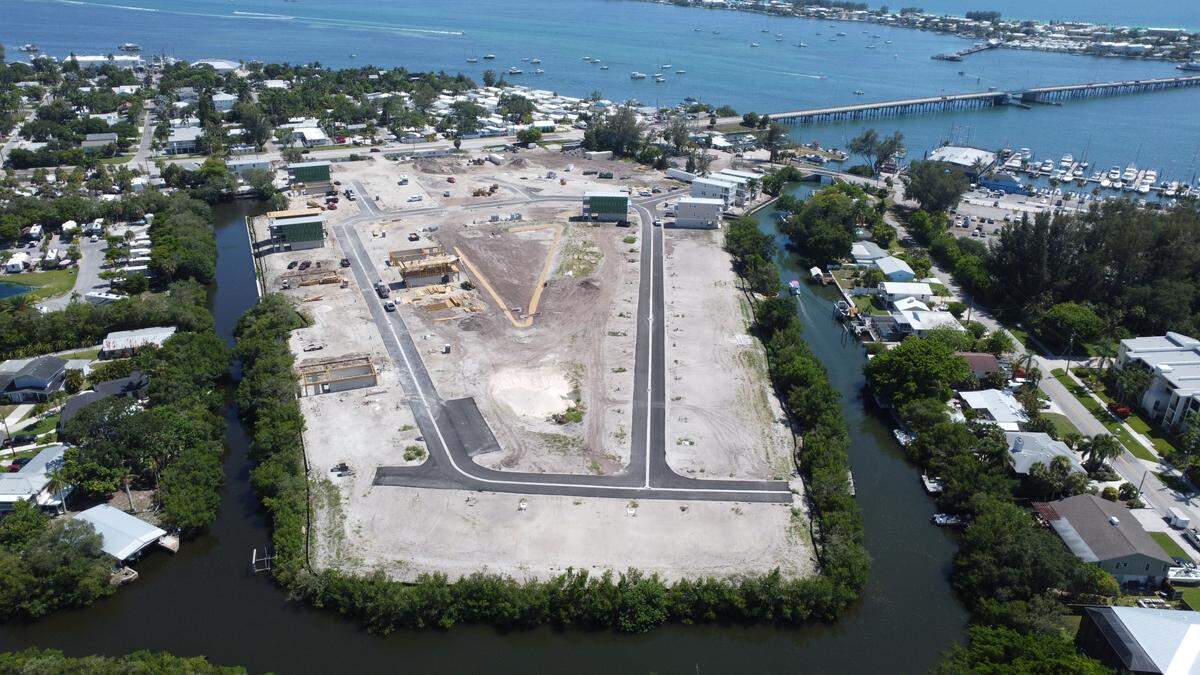 Marshall Gobuty, the developer of Bradenton’s Hunters Point, solves Net Zero problem, but faces rising costs and legal challenge from neighbor.