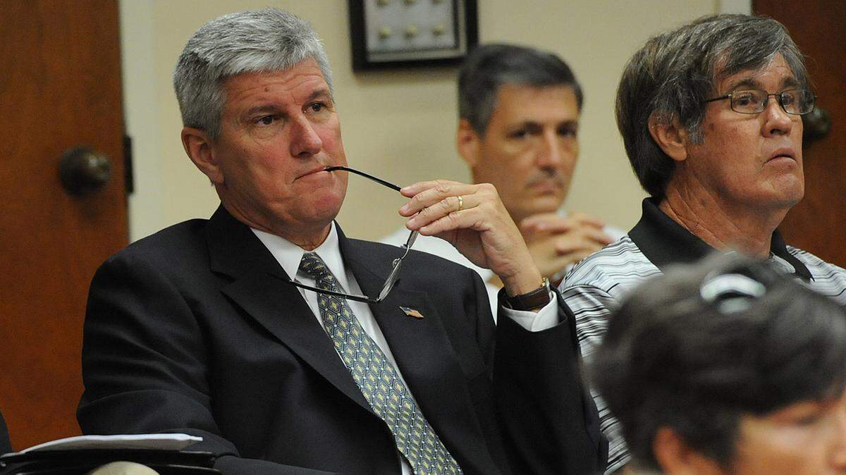 Bob Gause, left, is the agent for the owner of Palm View Golf Course which was up for discussion at the Manatee County Commission meeting Thursday. 
 TIFFANY TOMPKINS-CONDIE/Bradenton Herald