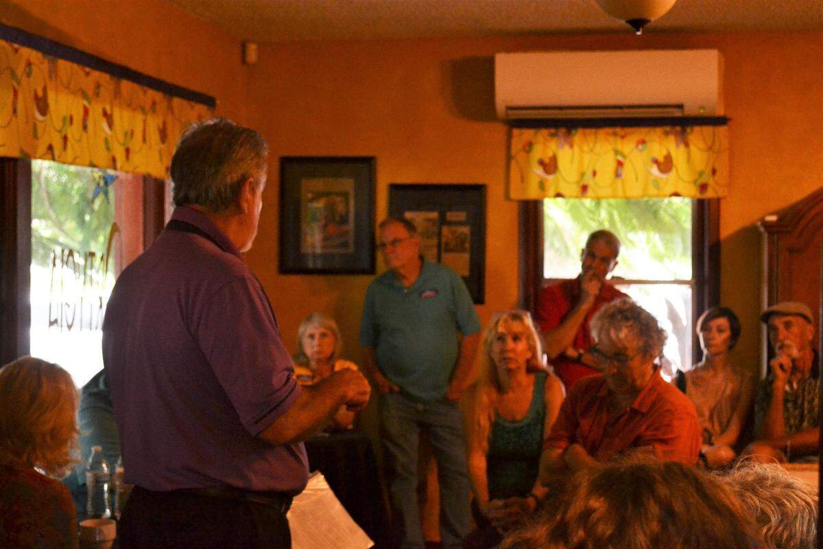 Candidate for Bradenton City Council Bill Sanders speaks to a group of voters in Village of the Arts.