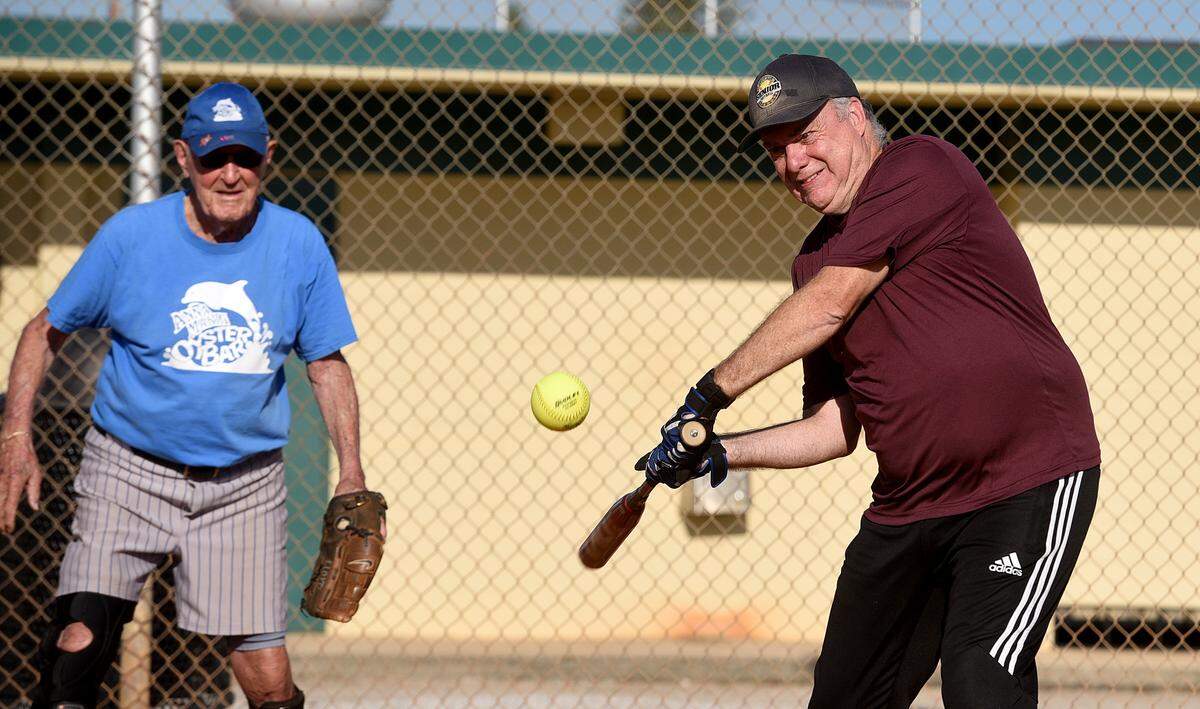 Rick Jenkins hits a single as he plays with other members of the Bradenton Senior Softball League on Thursday morning at G.T. Bray Park.