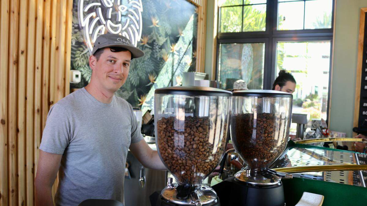 Justin Banister, shown above Sept. 20, 2022,  founded O&A Coffee and Supply in 2015 as a mobile coffee bar. In addition to the mobile coffee bar, he now has a coffee shop  in downtown Sarasota, and recently opened a coffee shop in Lakewood Ranch’s Waterside Place town center. 