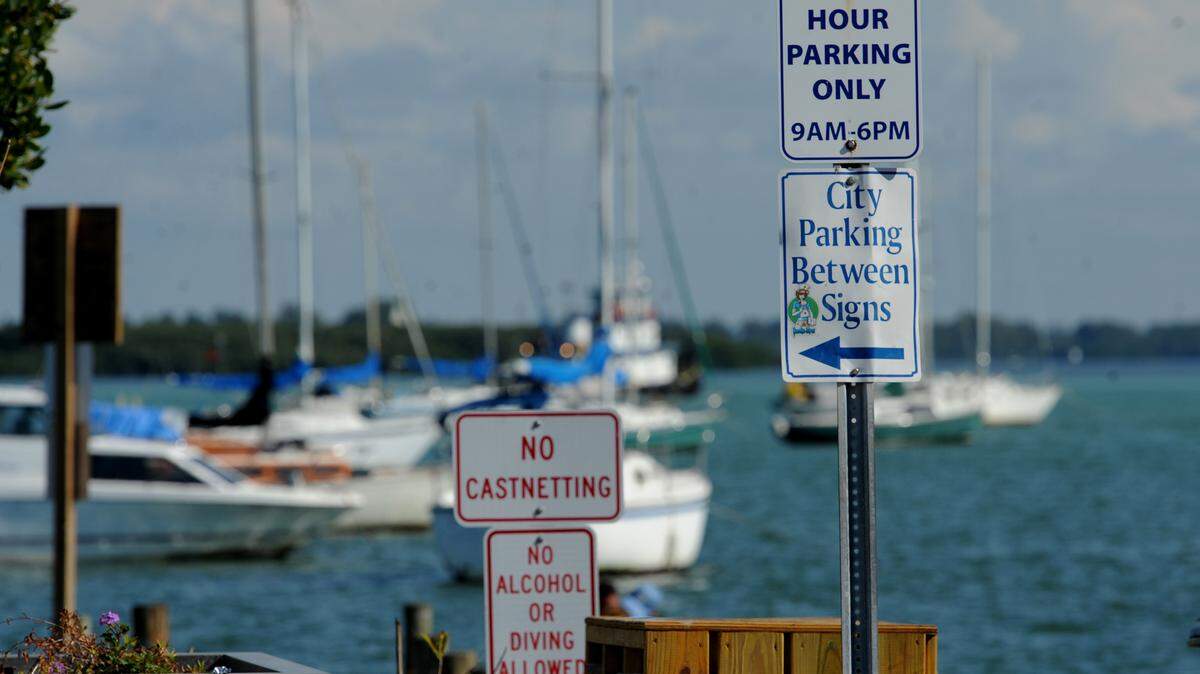 Numerous signs are posted in the Bridge Street area directing visitors to parking areas, but many find parking difficult, especially in the busy tourist season. Many of the businesses within the Bradenton Beach Business District have been looking at creative solutions to address the mounting parking and transportation challenges. Shuttle services are a part of an ongoing effort to spearhead the development of an interconnected multi-modal parking and transportation plan for Anna Maria Island. 
 GRANT JEFFERIES/Bradenton Herald