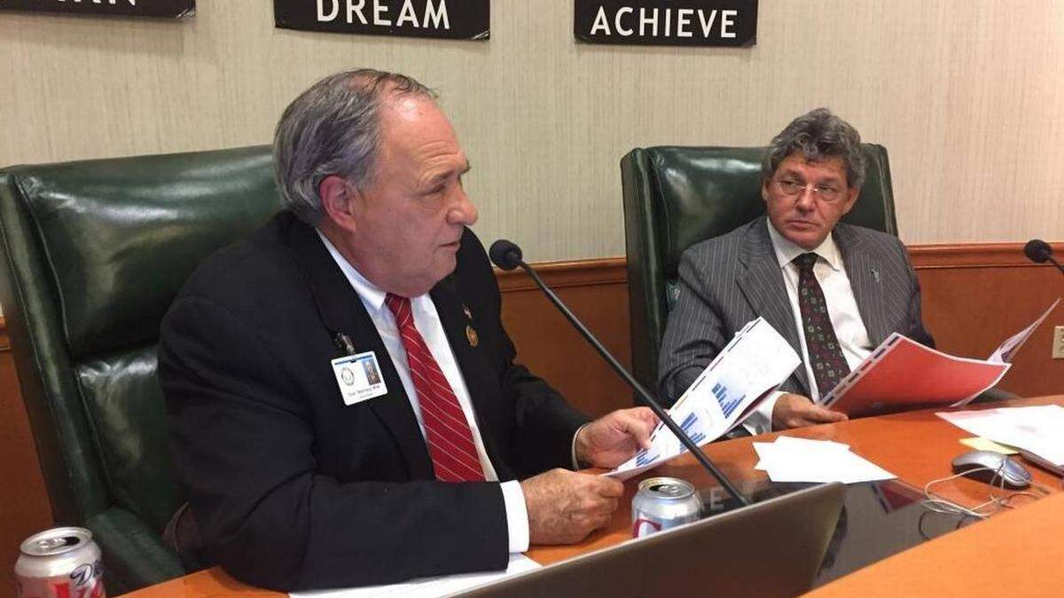 Manatee County School Board members Dave Miner, left, and Scott Hopes are shown at a previous school board meeting.