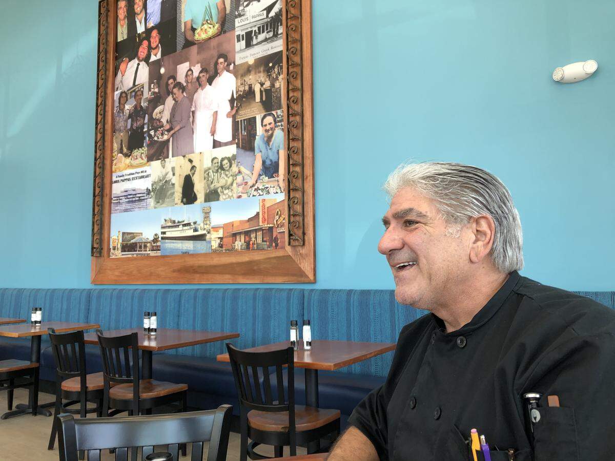 Louis Pappas, CEO of Louis Pappas Fresh Greek restaurants, greeted guests and worked with staff this week at his newest Louis Pappas Fresh Greek restaurant, which opens Thursday in University Park at 8512 Cooper Creek Blvd.