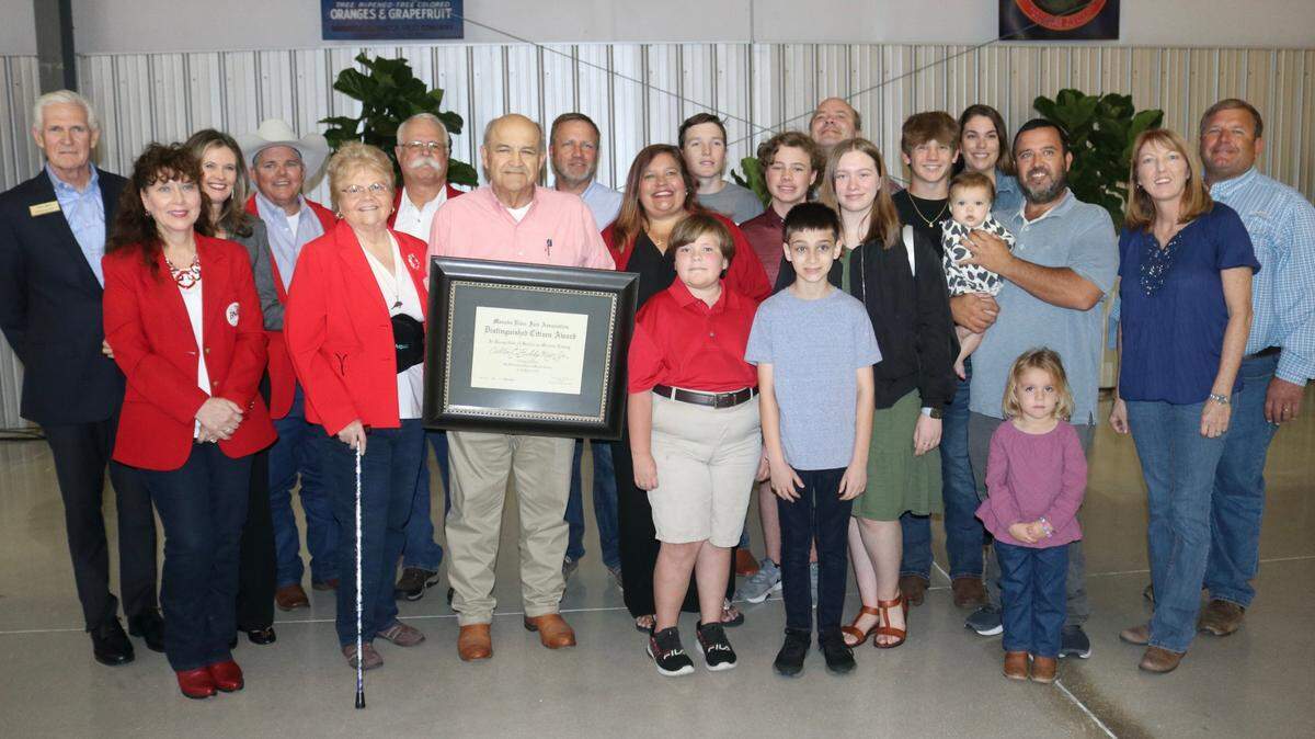 01/6/2022-Buddy Keen received the Manatee County Fair’s Distinguished Citizen Award on Thursday. He is shown after the award presentation with his family.