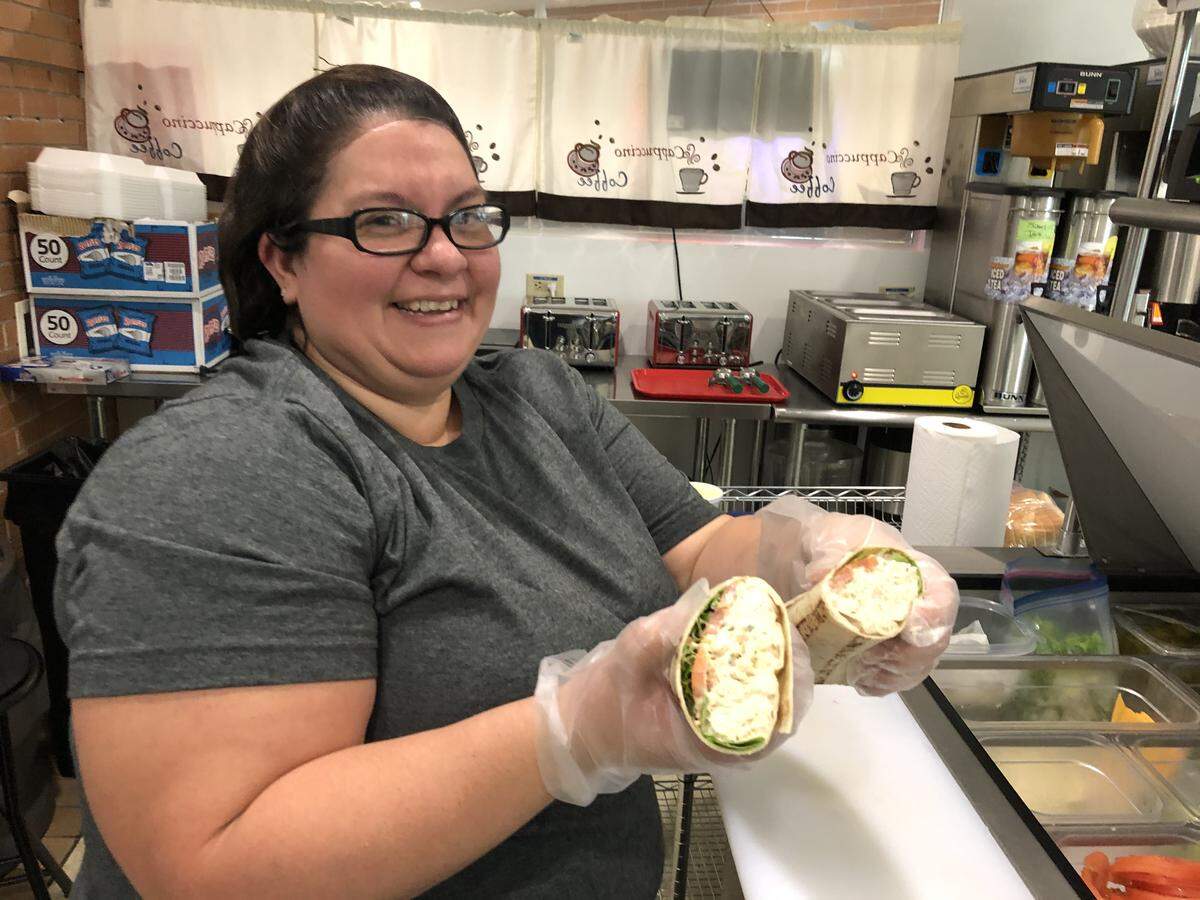 Diane Ramon makes a chicken salad wrap at Bandit’s Cafe. The restaurant is located on the ground floor of the Manatee County Judicial Center, 1051 Manatee Ave. W.