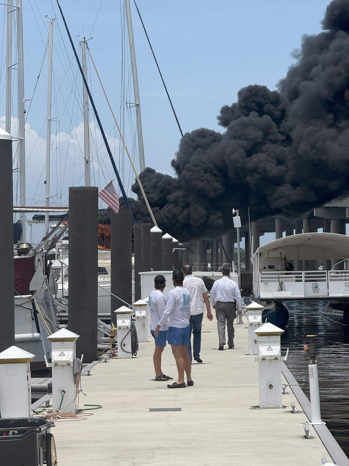 Bradenton Fire Department and City of Bradenton Fire respond to a boat fire at the Twin Dolphin Marina that was reported at about 1:30 on July 14, 2025.