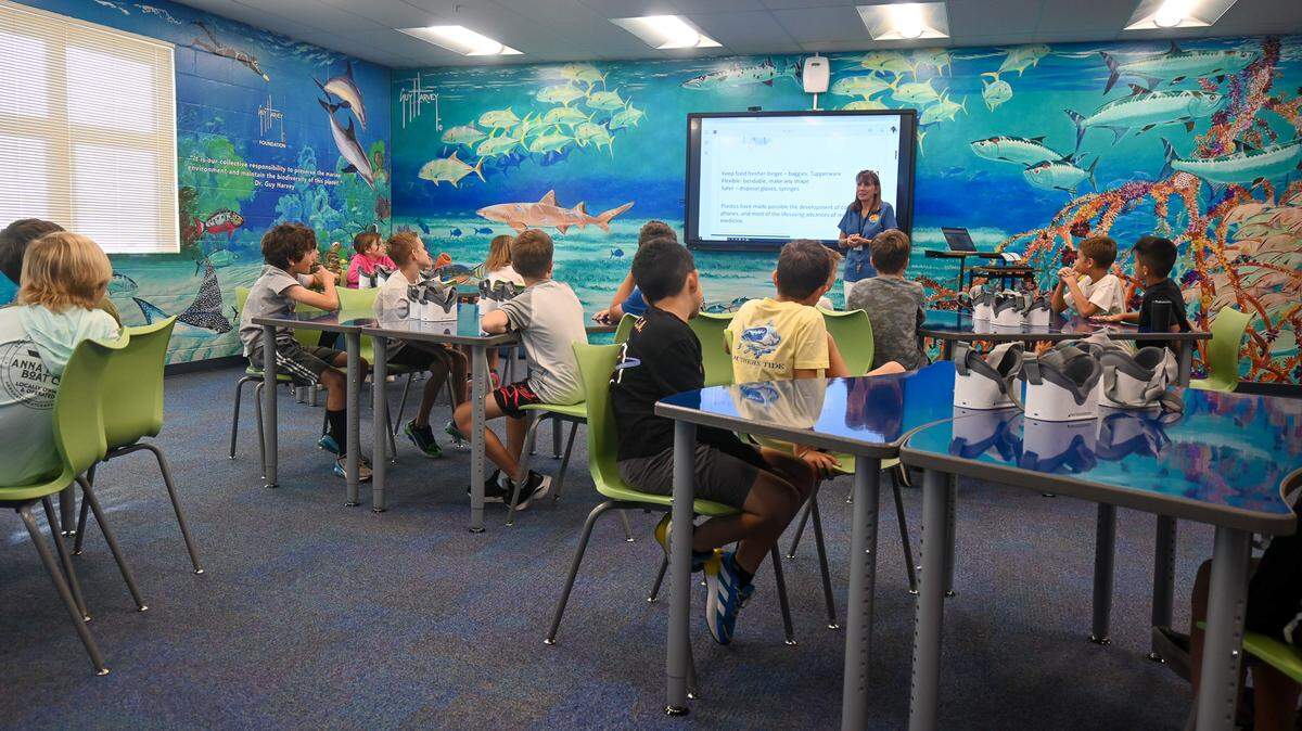 The specialized classroom at Anna Maria Elementary, designed and funded by the Guy Harvey Foundation, features a wrap of Guy Harvey’s artwork, virtual reality goggles and state-of-the-art technology.