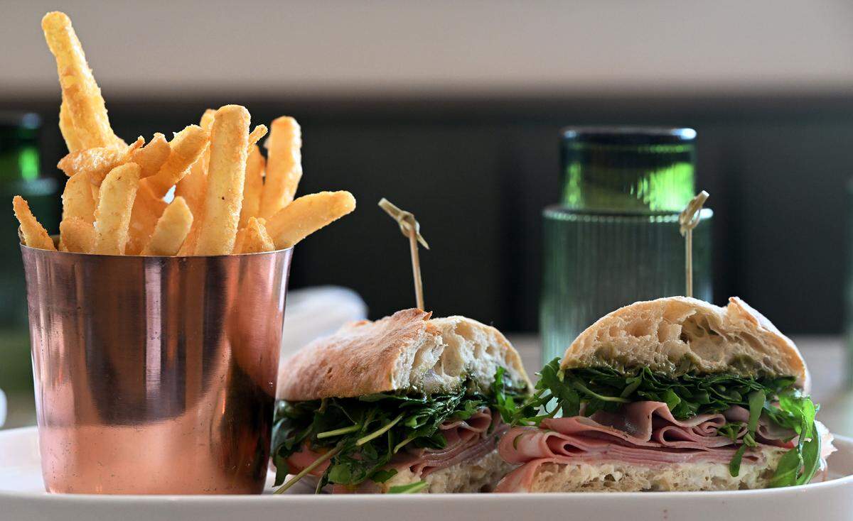 The Mortadella handheld with pistachio cream, torn burrata, arugula and lemon oil and served with parmesan fries at iDalia in Parrish on May 19, 2026.