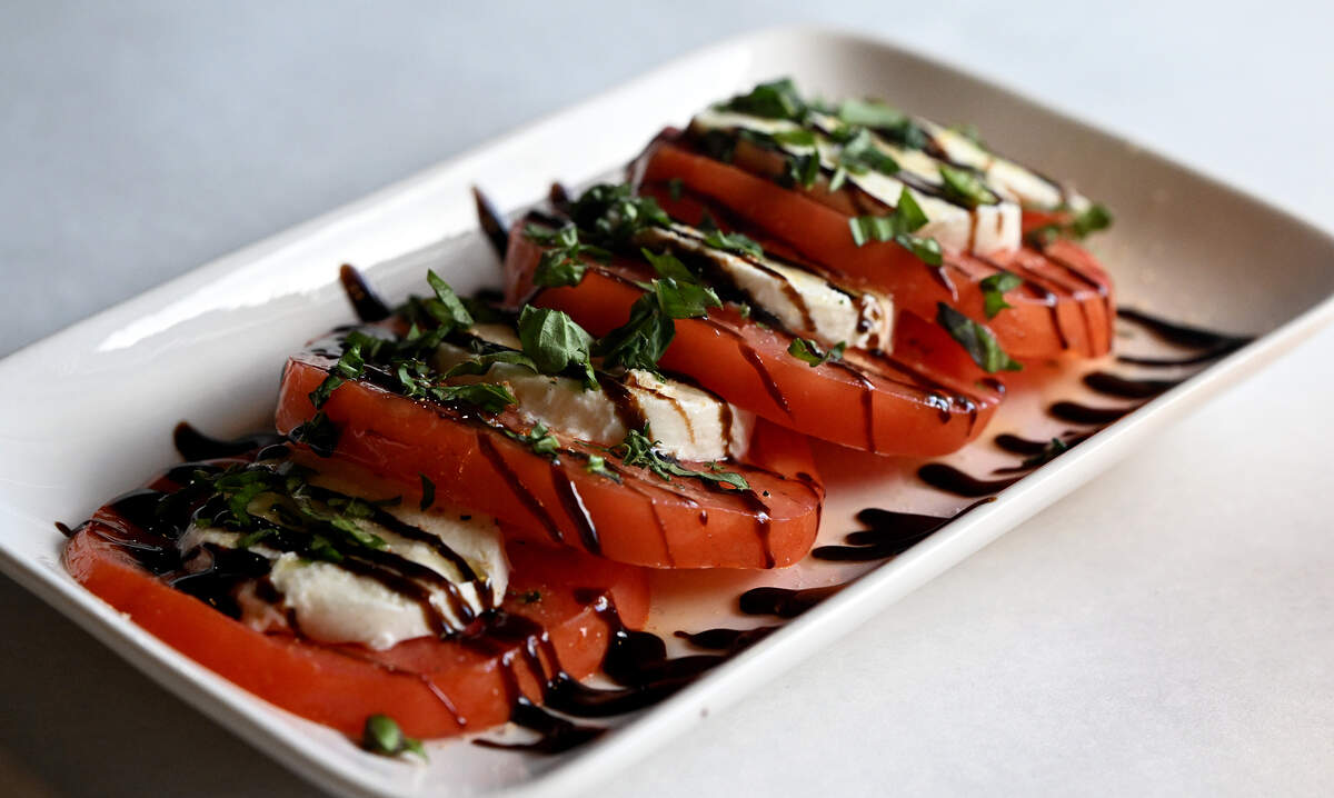Caprese with tomato, basil, mozzarella and balsamic vinegar glaze at the Dough Forge at 515 27th Street East, Bradenton on September 30, 2025. 