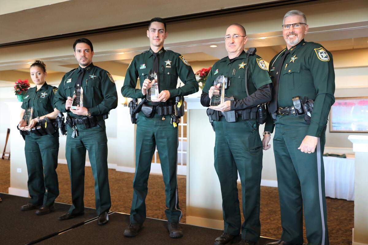 Manatee County Deputies of the Year winners Dep. Monica Ruiz, Dep. Hugo Garcia, Dep. Logan Wilson and Lt. Sean Felton with Sheriff Rick Wells.