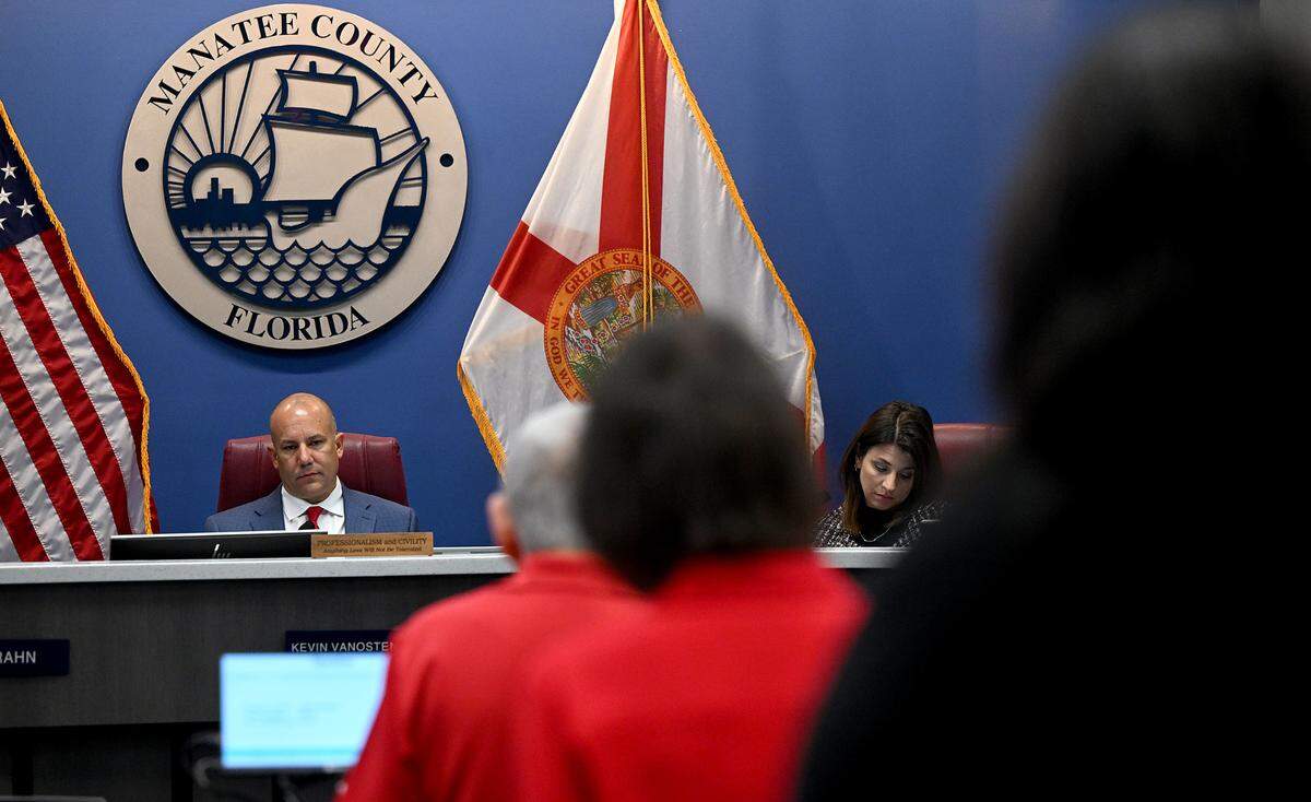 County Commissioner Kevin Van Ostenbridge listens to public comment as nearly two dozen Manatee County residents attend a public meeting Tuesday afternoon to share their thoughts on a proposed roundabout at the intersection of Lorraine Road and Players Drive in Lakewood Ranch.