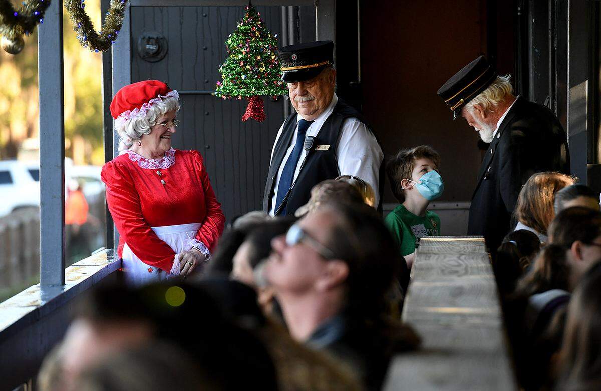 12/08/21—Children and their families boarded the North Pole Express at the Florida Railway Museum for a trip to meet Santa at the 36th annual event for terminally ill children.