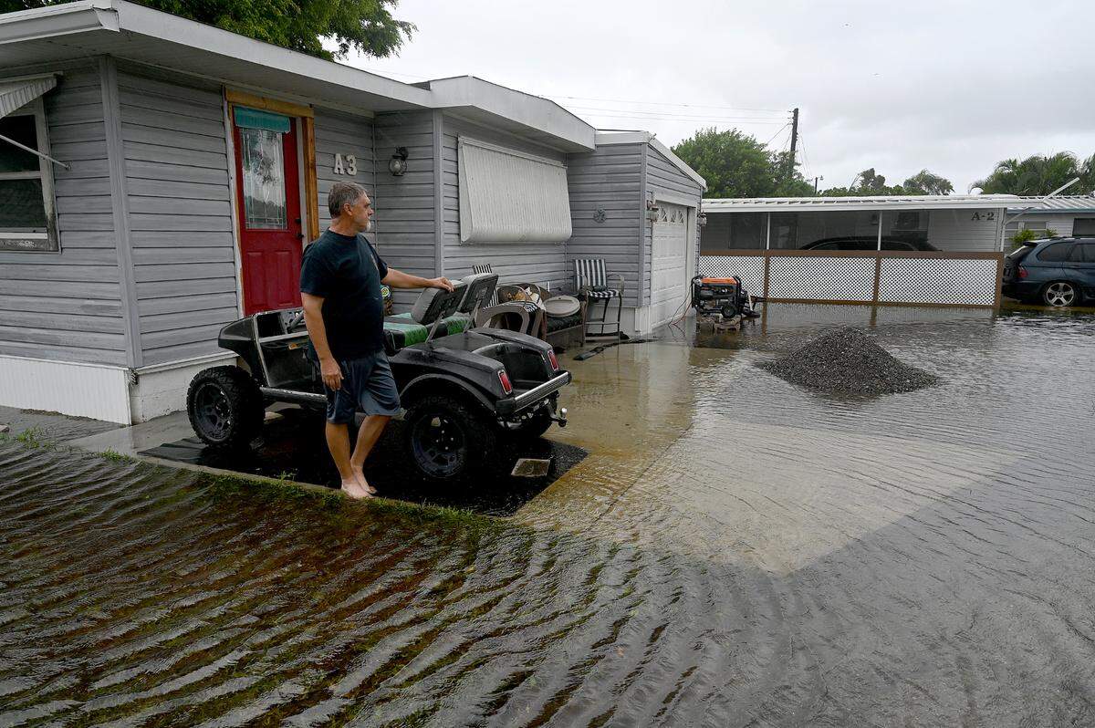 Roger Huffman’s home in Bradenton’s Villa Del Sol Mobile Home Park was without power and surrounded by water on Monday, Aug. 5, 2024, after Hurricane Debby soaked Manatee County.