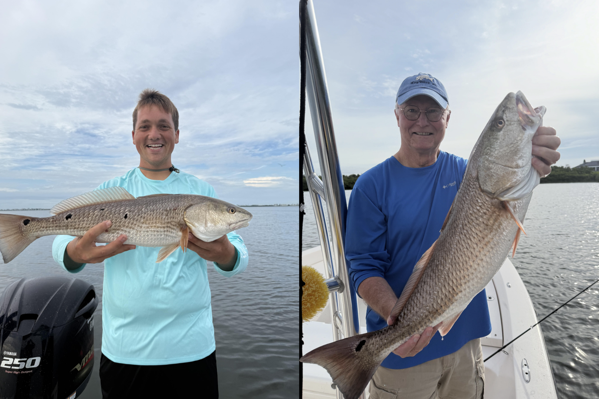 Anglers fishing with captain Andy Fialkowski pose with the redfish they caught fishing on the flats.