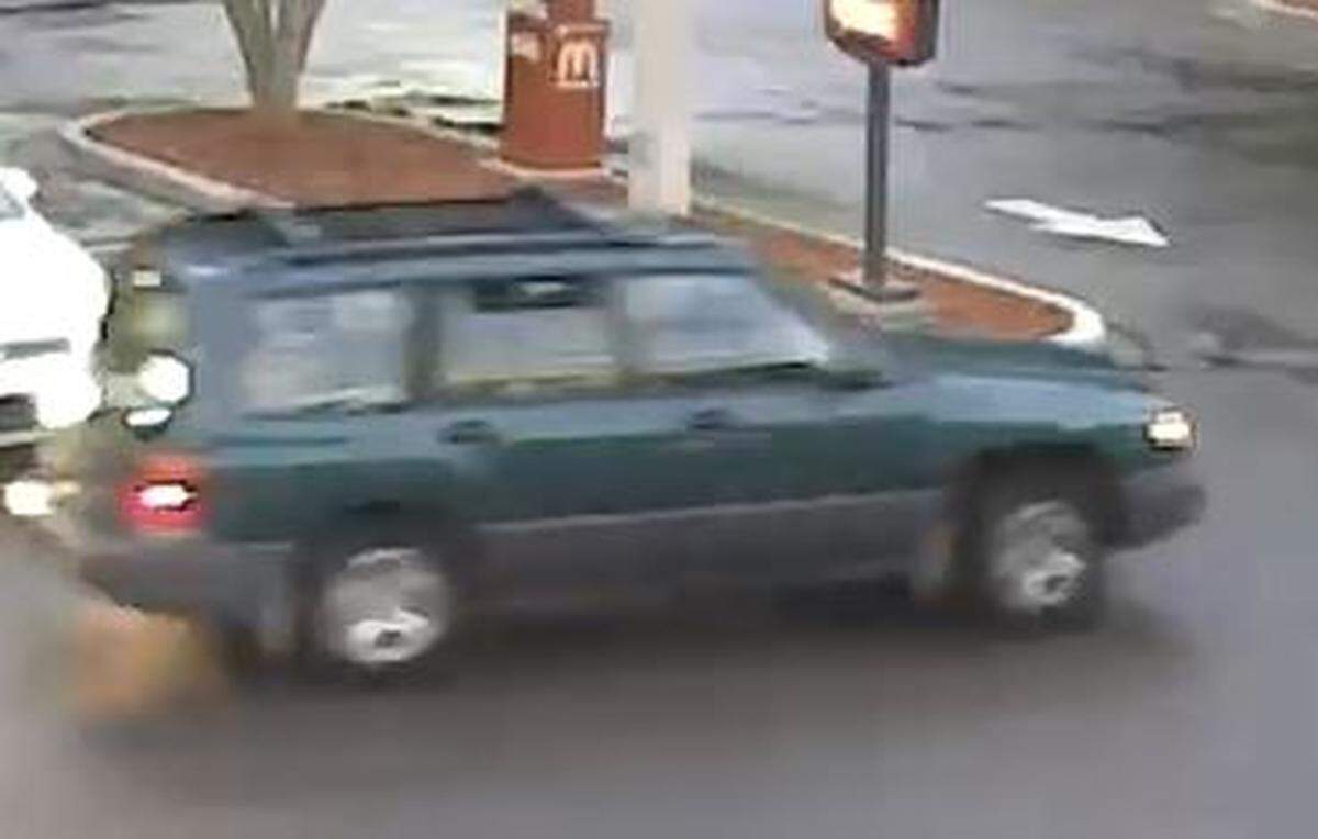 Daniel Davenport wanted on a murder charge in connection to the death of a 55-year-old Sarasota man was spotted driving the victim’s green Subaru Forrester, pictured here, most recently in Orlando on Monday.
