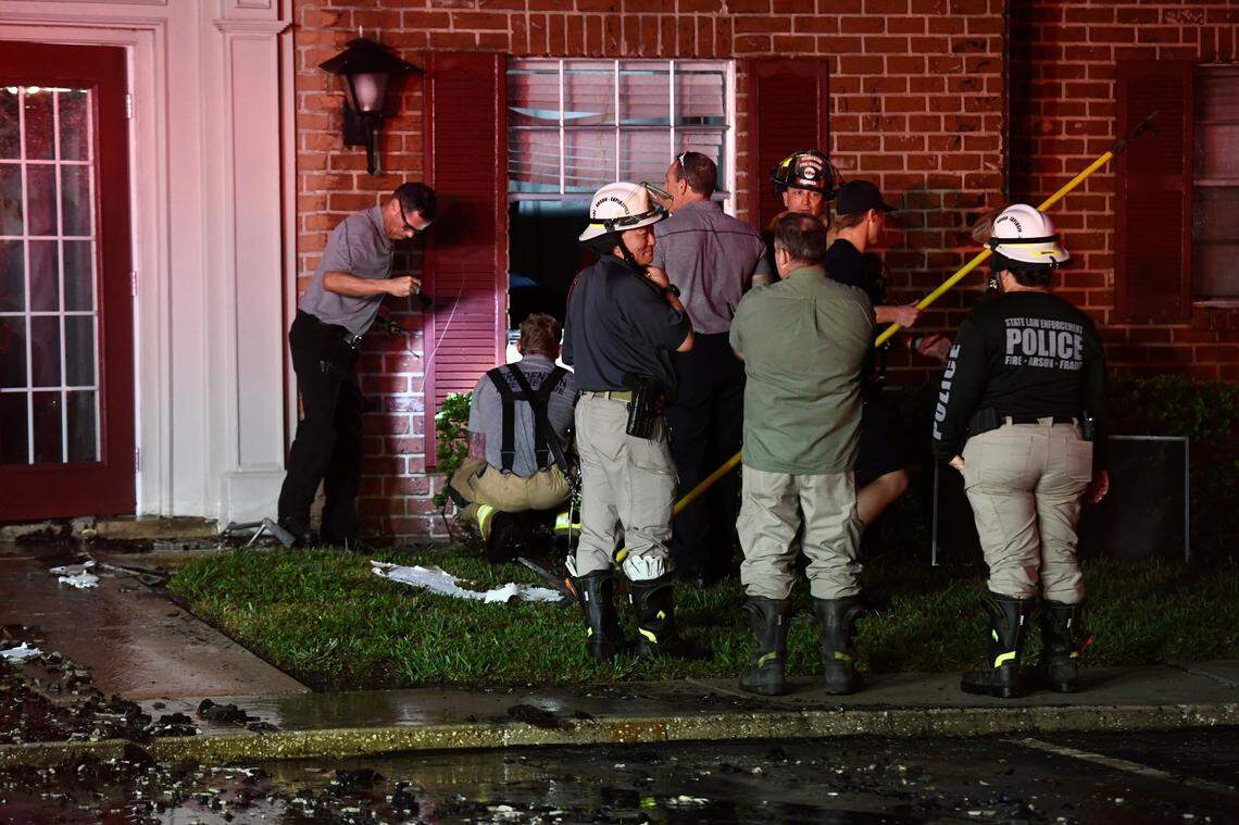 Firefighters work at the scene a fire at Carlton Arms of Bradenton apartments on Wednesday, Jan. 4, 2023.