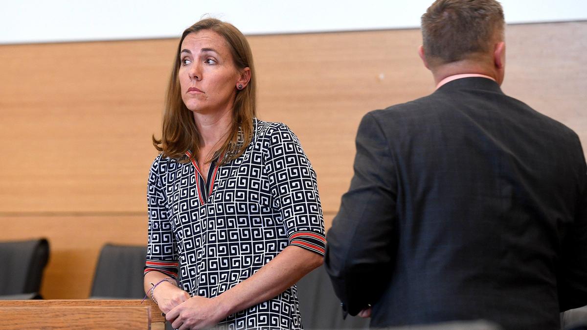 Heather O’Leary looks towards Judge Gilbert Smith in court to plead guilty to scheming to defraud for stealing more than $67,000 from Galati Yacht Sales. She was sentenced to 5 years probation and must pay restitution.