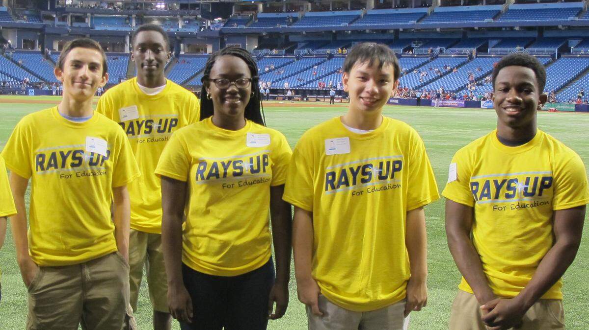 The 2015 Rays Scholars, Lucas Naranjo (Lakewood Ranch High Freshman), Tyrese Galloway (SCF Collegiate Junior), Jeana Alexandre (Bayshore High Freshman), Steven Nguyen (Palmetto High Freshman), and Joe Clerjuste (Manatee High Freshman), pose for a photo at Tropicana Field. PHOTO PROVIDED