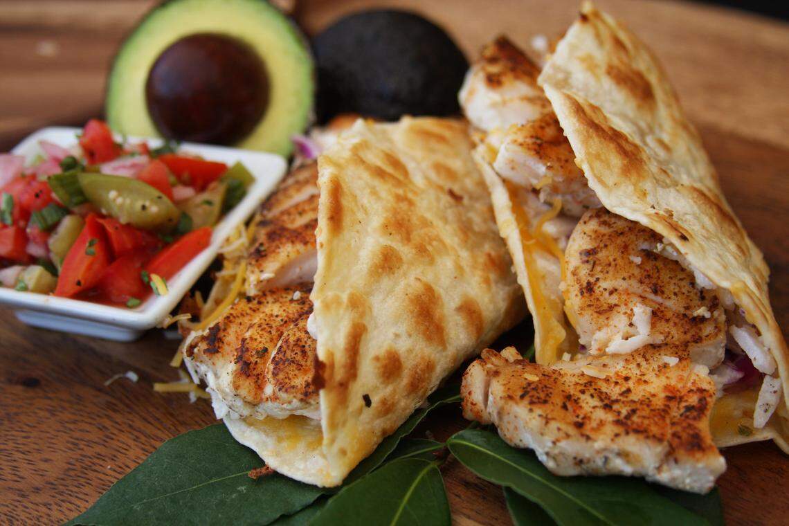 The grouper tacos at The Waterfront Restaurant on Anna Maria Island come with fresh-chopped pico de gallo and jicama tartar slaw.