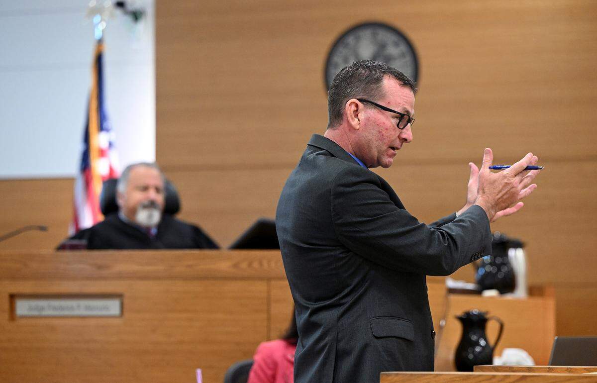 Defense attorney Sean Powers makes his opening statement to the jury for the murder trial of Shamar Johnson , who appeared in court for the 2021 shooting that killed Cecil Richardson.