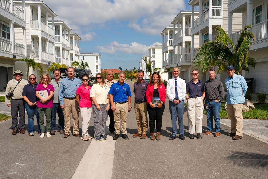 Members of the Pearl Homes team pose with staff from the Federal Emergency Management Agency and Manatee County Government during a visit after Hurricane Milton to recognize the development’s resilience through the 2024 hurricane season.
