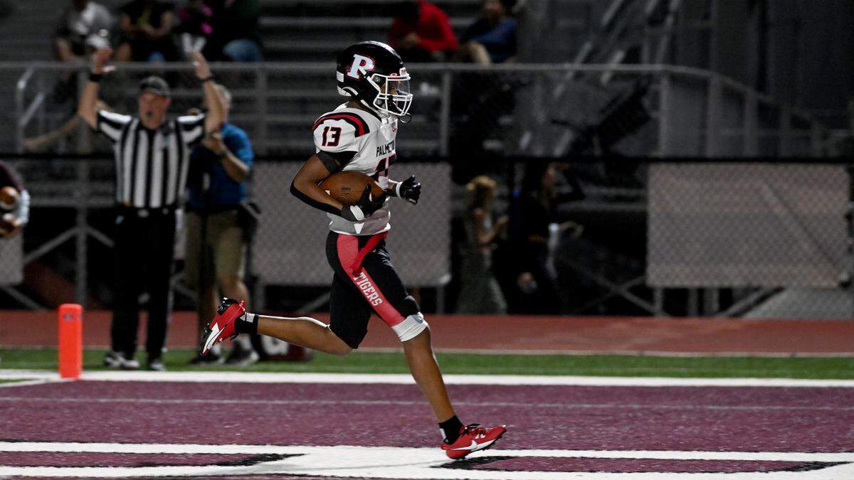 Palmetto’s Jamari Parker scores a touchdown against Riverview during the FHSAA playoff game in Sarasota Friday, Nov. 10.