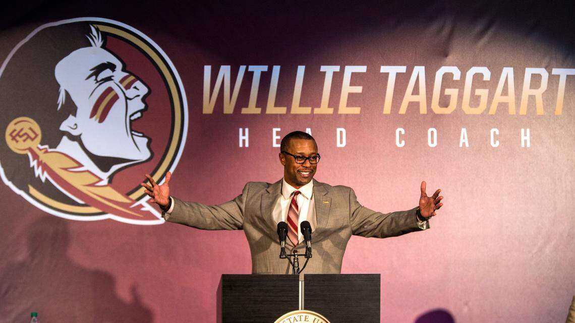 In this Dec. 6, 2017, file photo, Willie Taggart gestures as he is introduced as Florida State's new football coach during an NCAA college football news conference in Tallahassee.