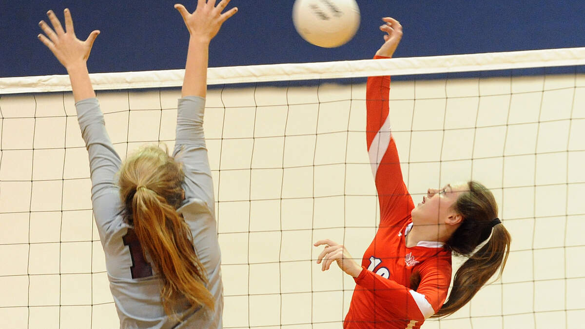 Manatee's Jojo Coulter jumps for the ball in a game against Riverview Saturday in the 2nd round of state playoffs. 
 TIFFANY TOMPKINS-CONDIE/Bradenton Herald