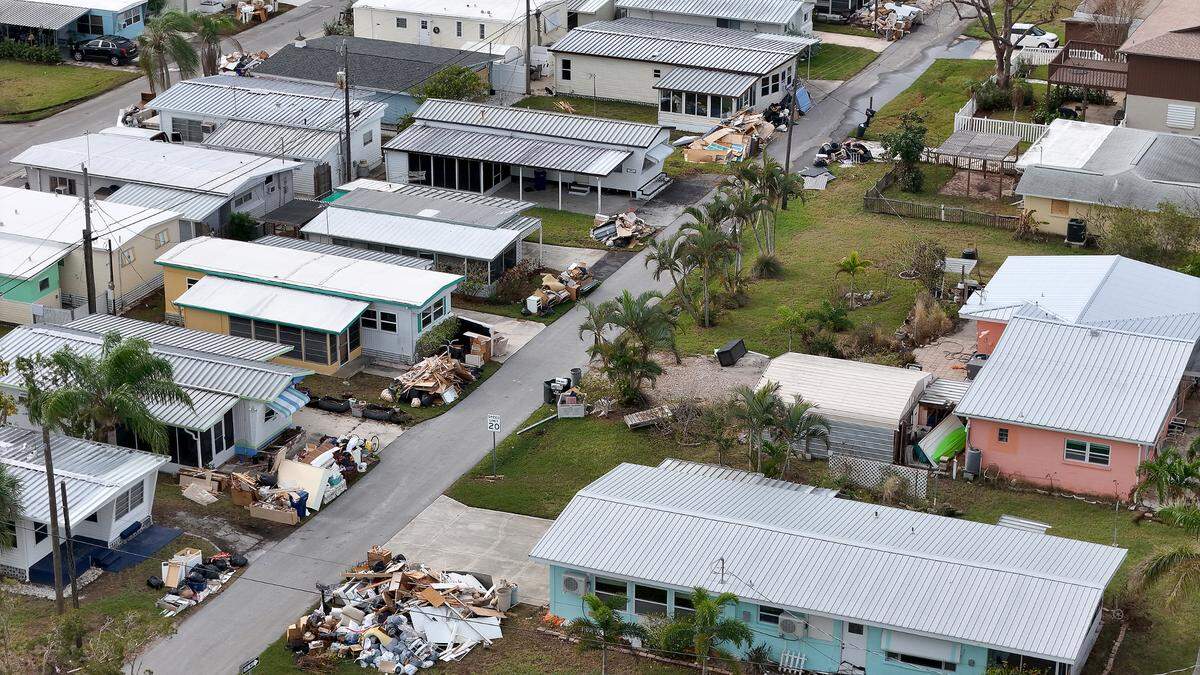 Debris from Hurricane Helene lines the streets in Sunny Shores as Hurricane Milton approaches Manatee County on Oct. 8, 2024.