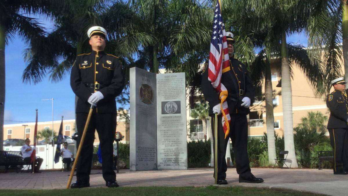Honor Guard members stand at the ready at Friday’s 911 tribute on the Bradenton Riverwalk.
