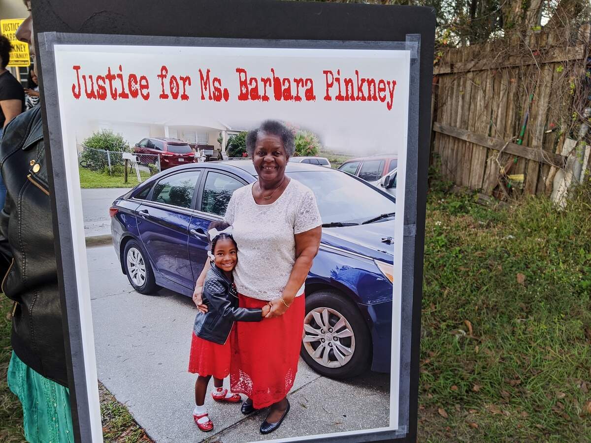 A demonstrator holds a sign in support of Barbara Pinkney, a 70-year-old Bradenton woman who was tased and arrested by Manatee County Sheriff’s Office deputies after they say she interfered in the execution of an arrest warrant.