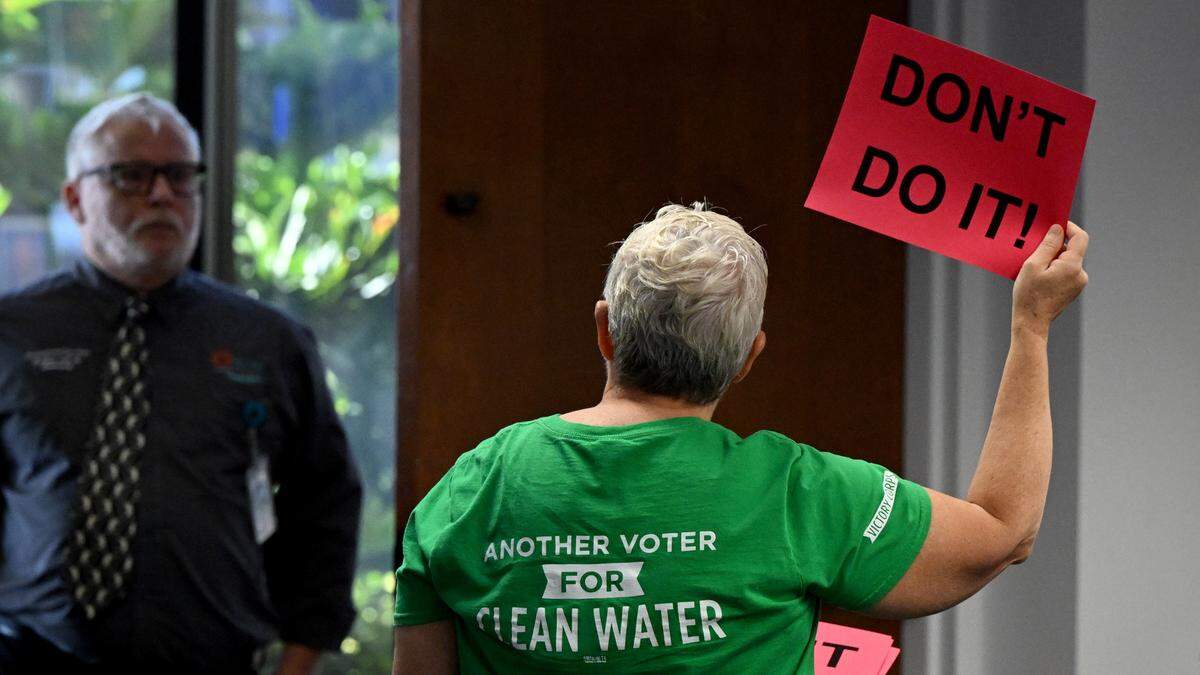 Several people protested the proposed changes to the counties wetland buffers during a meeting of the Board of County Commissioners on Thursday, Oct. 5, 2023.