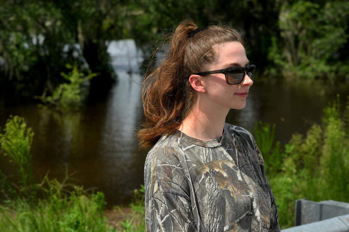 Nicole Phelan describes waking up to find her pasture, behind her, flooded with rain and outflow from Lake Manatee after Hurricane Debby.