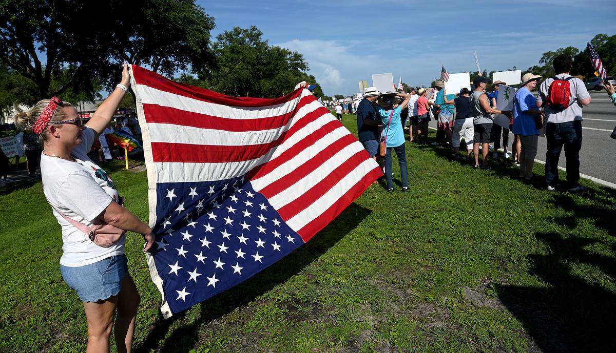 Hundreds attend the No Kings protest organized by Indivisible Manatee near the University Town Center along University Parkway in Sarasota on June 14, 2025.