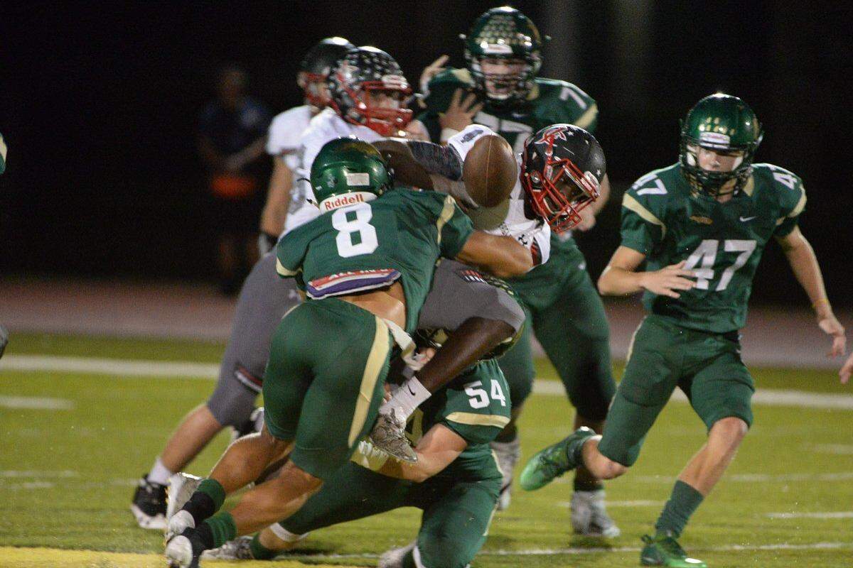 Linebacker Truman Carlsen (54) is one of the leaders on the Saint Stephen’s defense.
