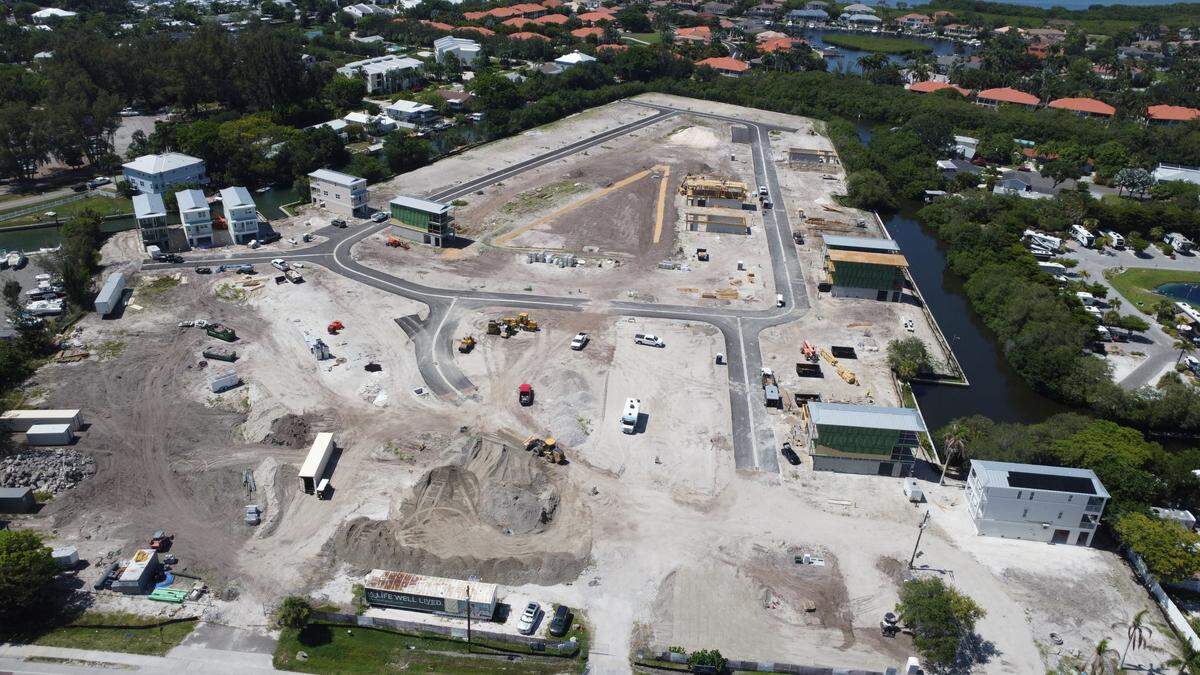 Marshall Gobuty, the developer of Bradenton’s Hunters Point, solves Net Zero problem, but faces rising costs and legal challenge from neighbor.