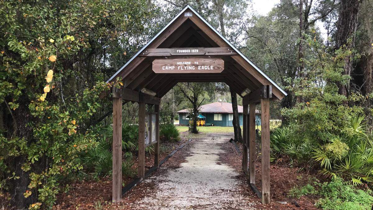 The walk way leads to the scout master’s building at Camp Flying Eagle at 16009 Upper Manatee River Road in East Manatee.