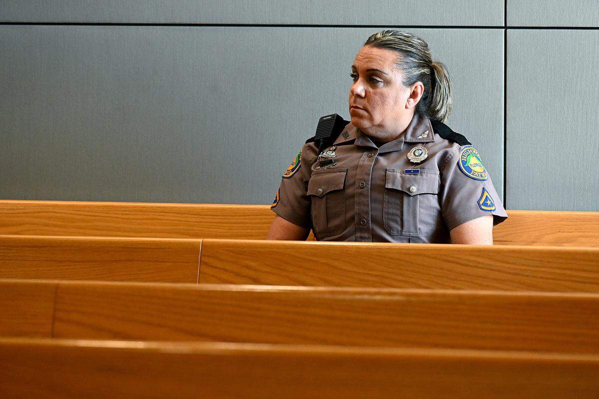 Florida Trooper Toni Schuck attended a hearing for Kristen Watts, who appeared in court at the Manatee County Judicial Center before Judge Charles Sniffen. Watts was charged with driving drunk onto the Skyway Bridge during the annual 10k race, hitting Trooper Schuck head-on when the trooper moved into her path to protect the runners.