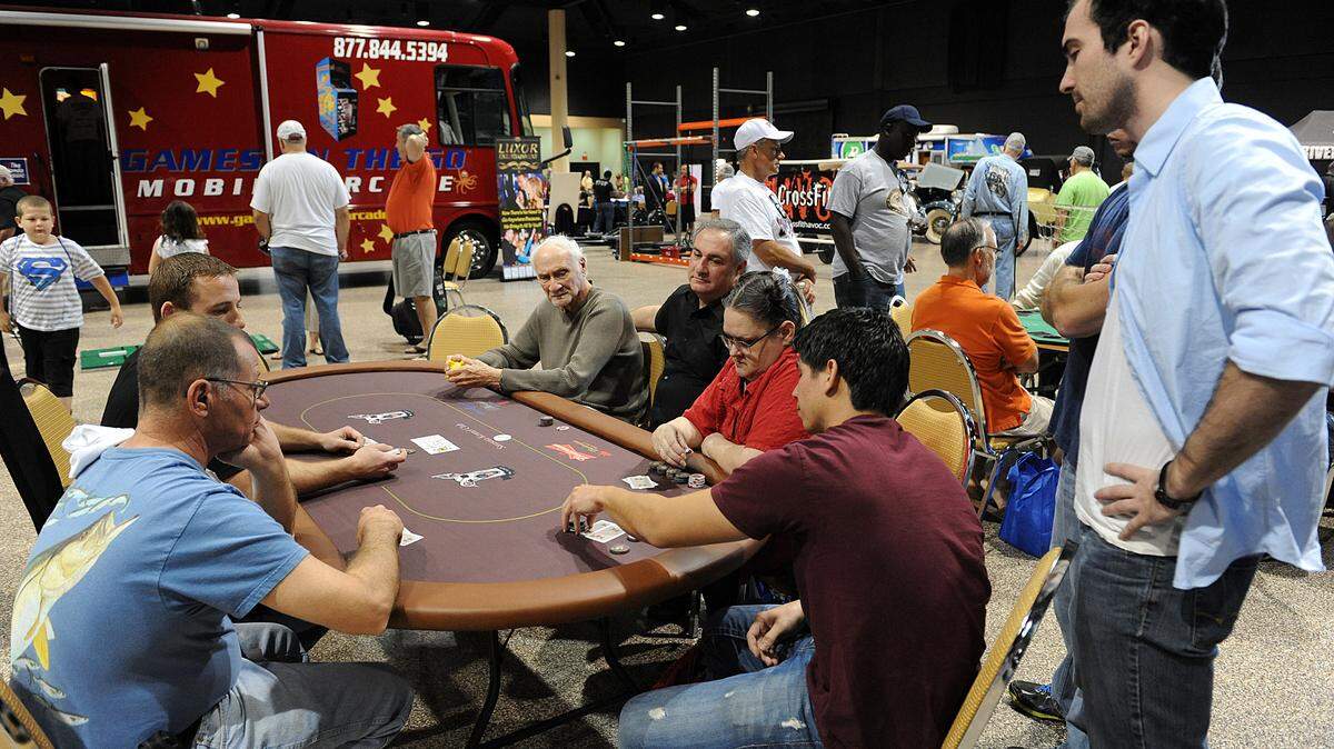 A card game is just part of healthy fun at the Guy Expo.HERALD FILE PHOTO