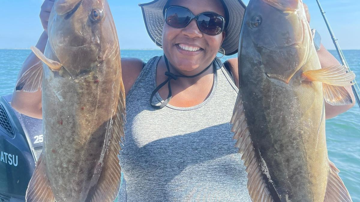 Shari Barrington from Orlando who caught a pair of gag grouper fishing in Tampa Bay with Capt. John Gunter.