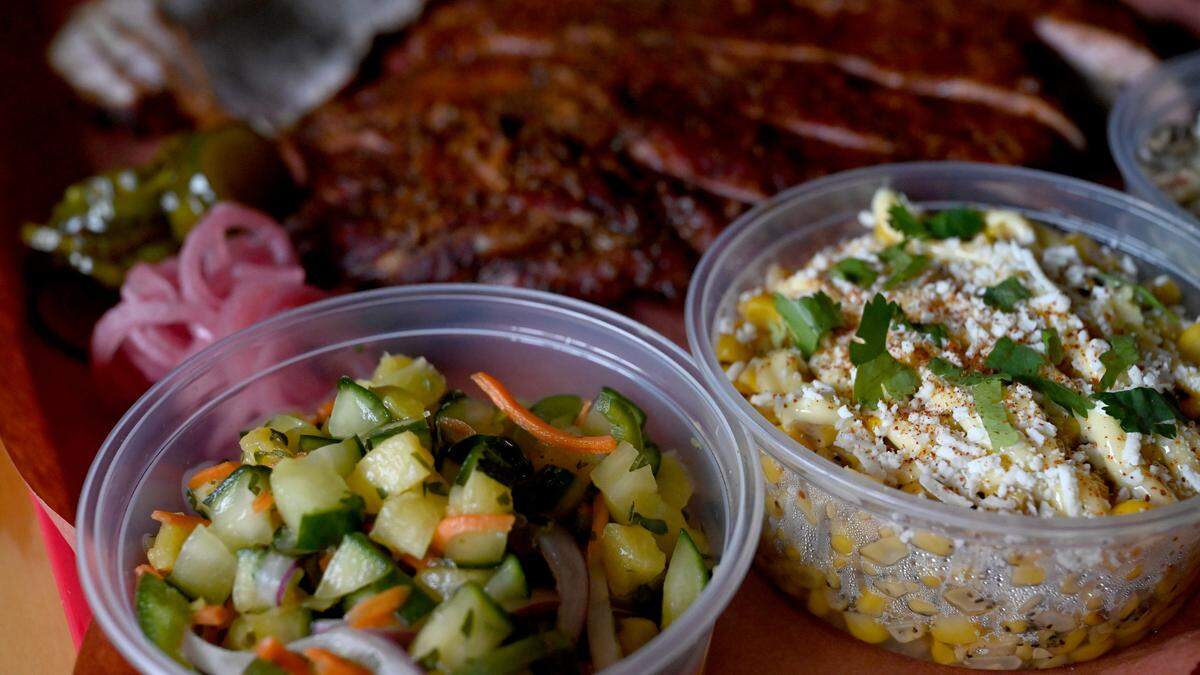 Brisket, ribs, turkey and sides served on a tray at the Twisted Pit BBQ on Main Street in Lakewood Ranch.